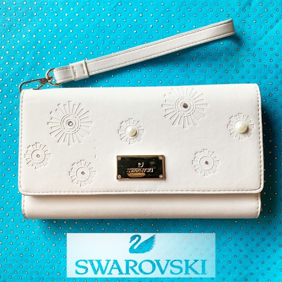 Swarovski Handbags - Swarovski cream white leather large wallet and cell phone case and wristlet